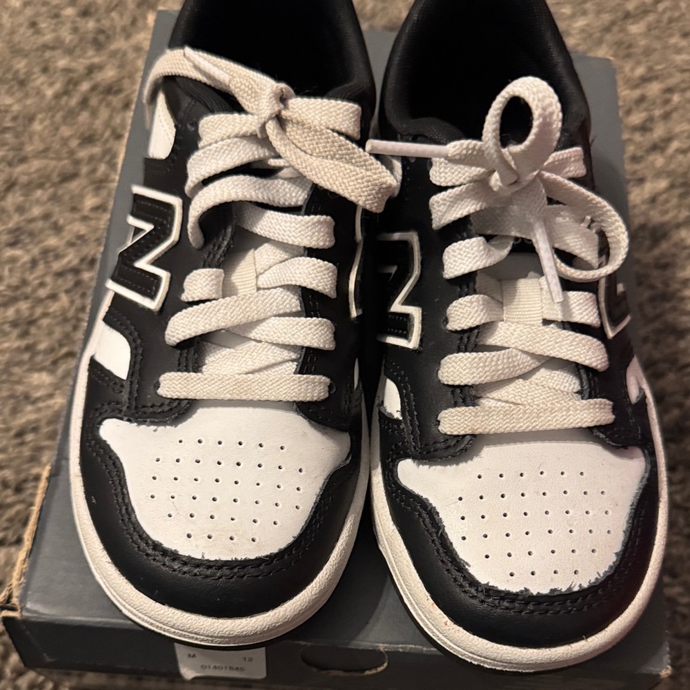 New Balance Kids Black and White Sneakers